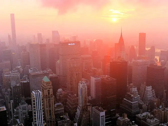 Empire State Building tickets - Soloppgang over East River